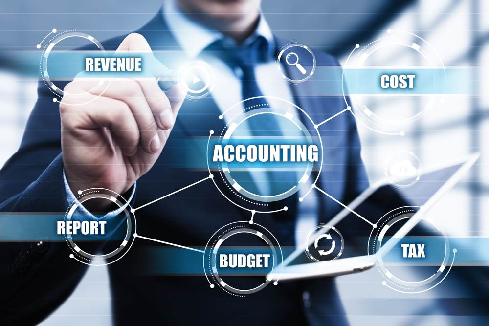 Decorative; man in business suit pointing at accounting terms